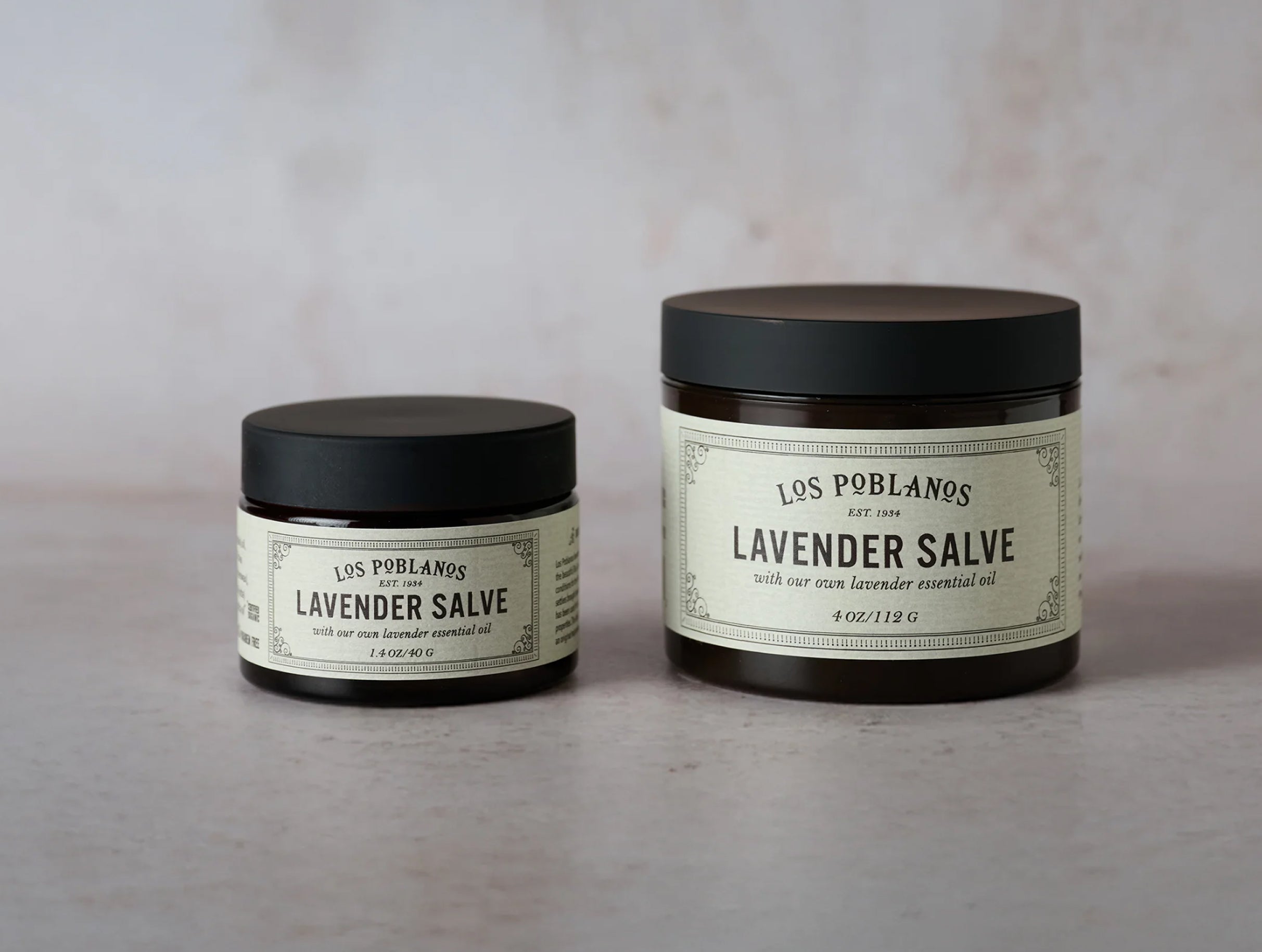 Two jars of Los Poblanos Lavender Salve on a neutral background