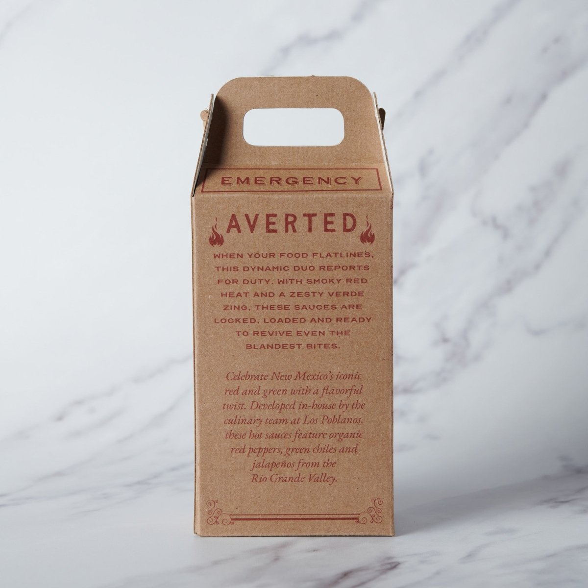 Kraft paper product packaging with red text on a marble surface